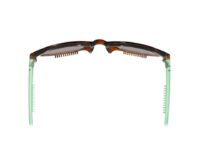 A pair of glasses with green frames and a comb.