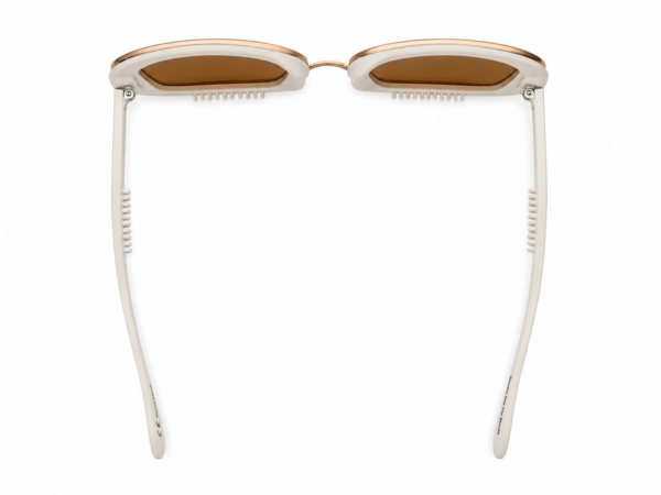 White-framed sunglasses with brown lenses